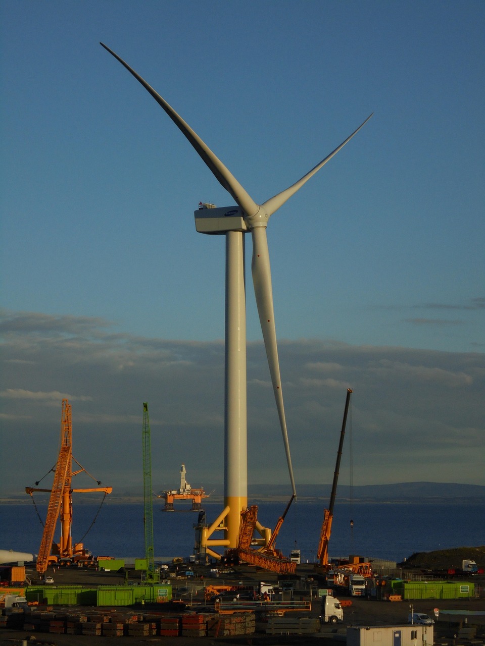 Offshore wind turbines at sunset